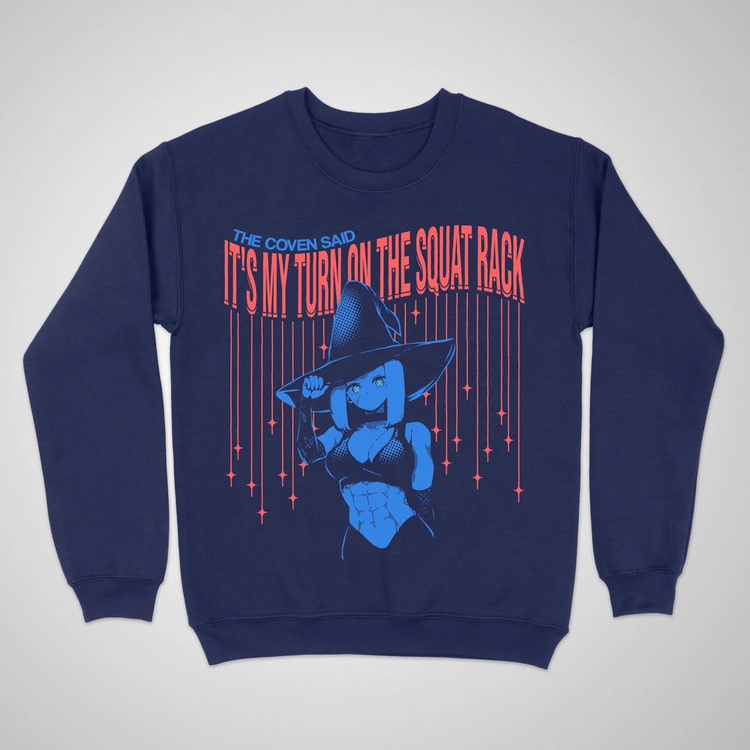 Navy crewneck sweatshirt with an anime witch and "It's My Turn on the Squat Rack" lettering on the front.