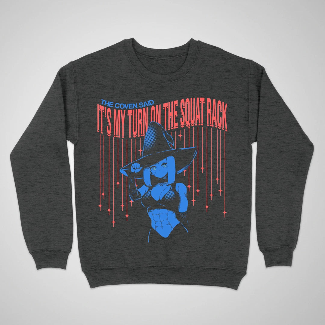 Dark heather crewneck sweatshirt with an anime witch and "It's My Turn on the Squat Rack" lettering on the front.