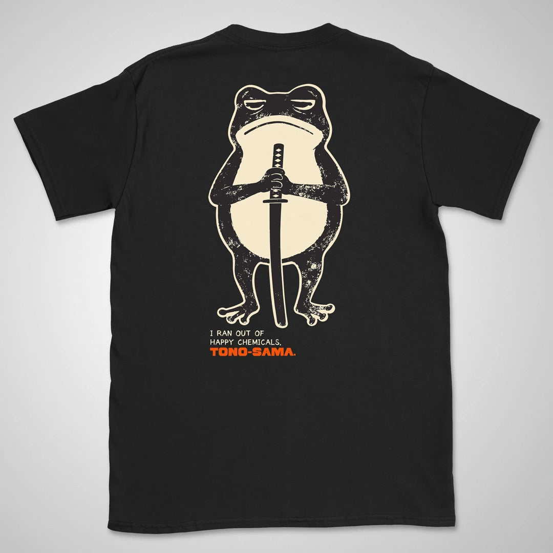 Black T-shirt with a grumpy cartoon frog holding a katana, above "I Ran Out of Happy Chemicals, Tono-sama" lettering on the back.